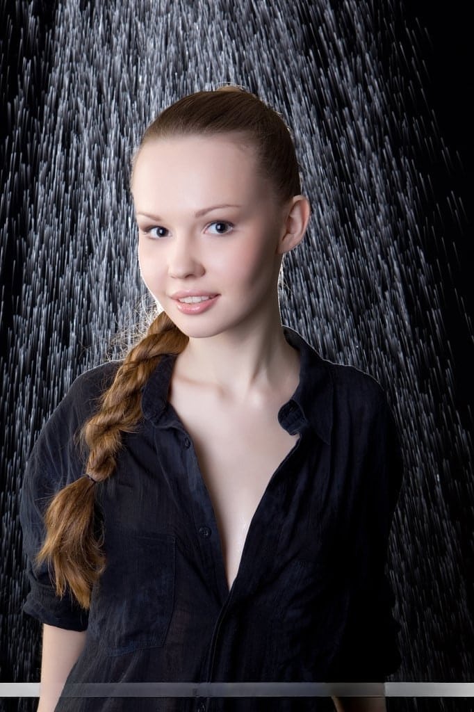 Innocent teen girl Virginia Sun stripping down to black nylons under waterfall