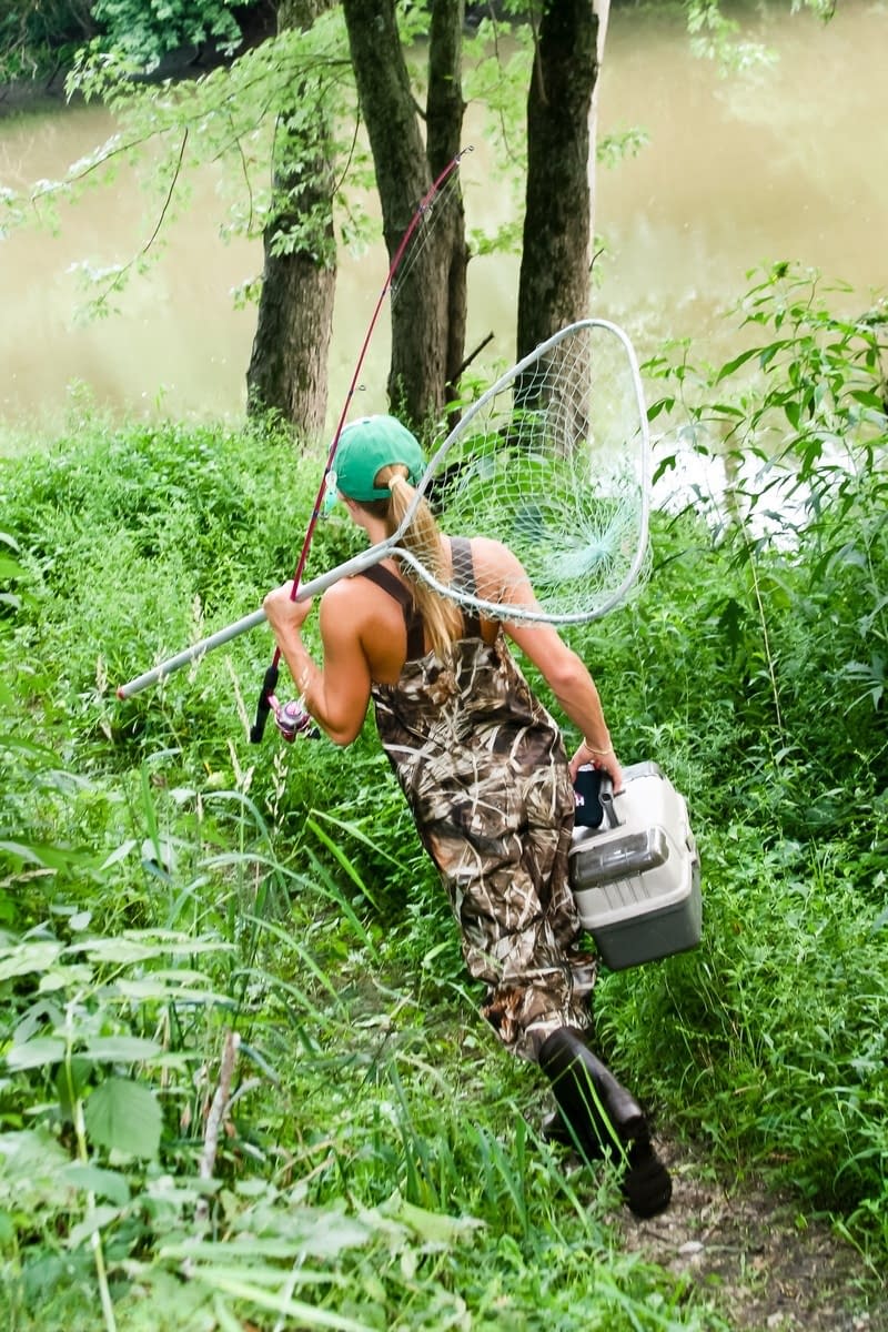 Non nude amateur Meet Madden slipping off hip waders while fishing