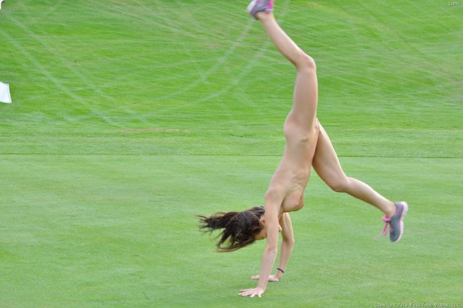Fit chick strips off sports workout clothes to model naked on golf course