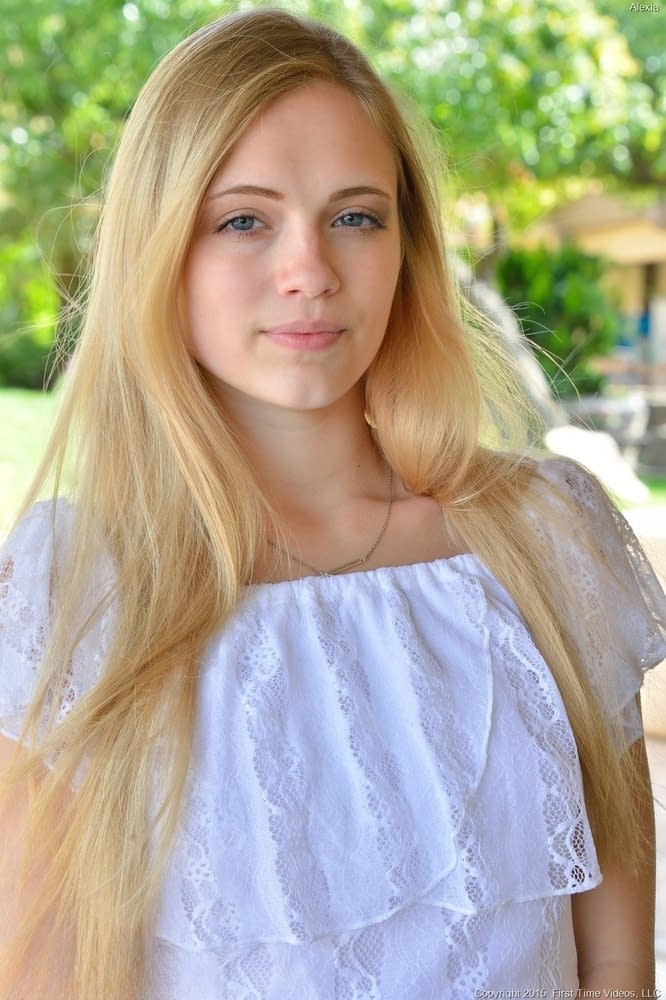 Cute teen takes off her clothes and goes for a naked walk down the road