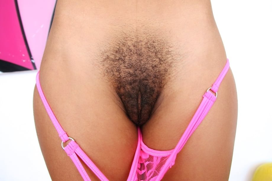 Black girl shows off her hot booty and hairy ebony pussy in pink socks