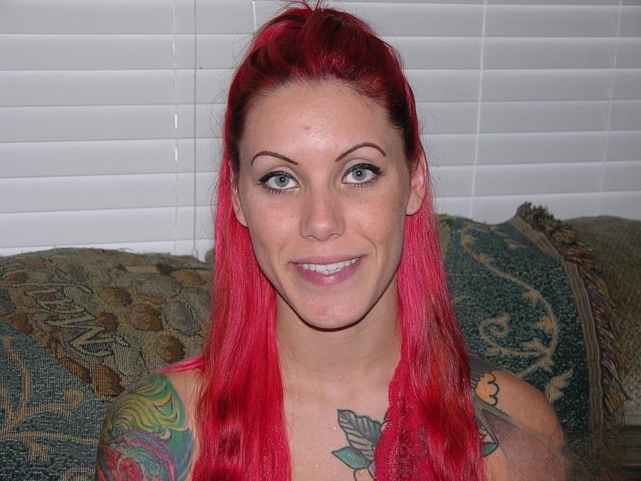 Tattooed redhead Jae puts the focus on her pierced pussy during her nude debut