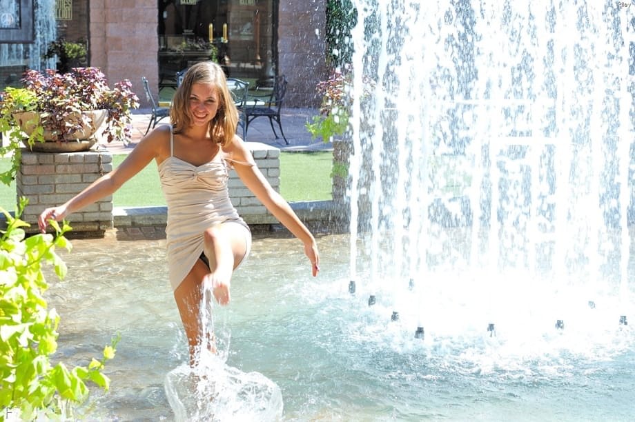 Cute teen girl shows her exhibitionist side by walking around nude in public