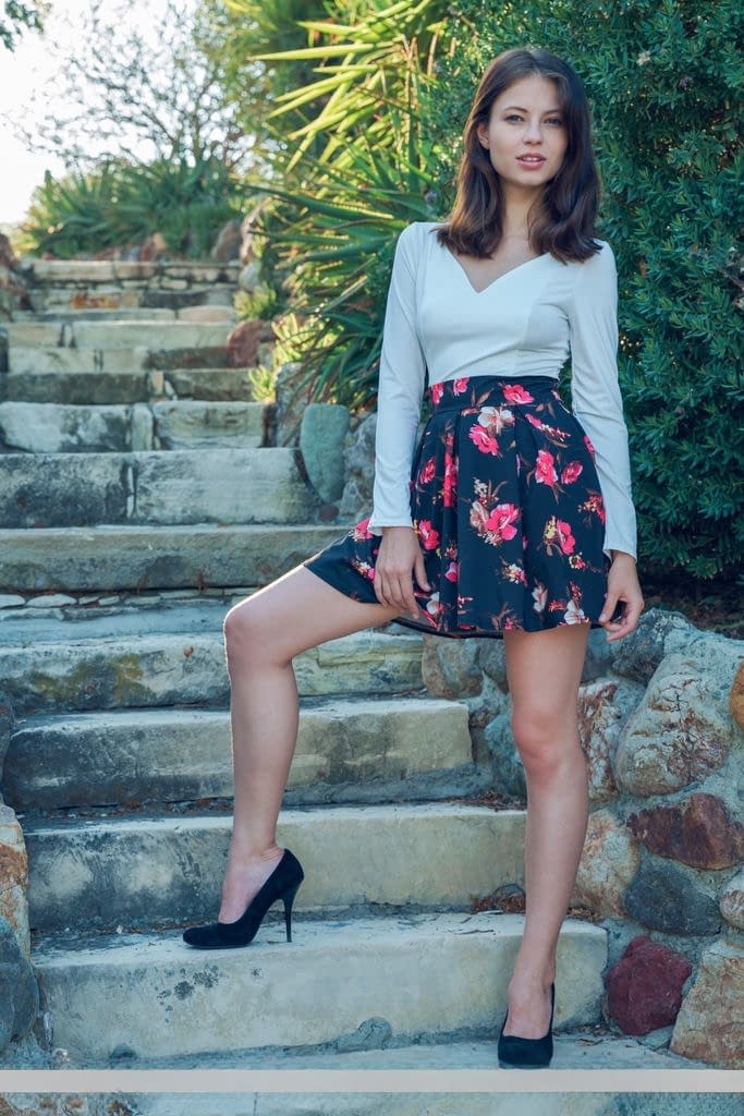 Cute solo girl Hilary C takes off her up skirt panties to pose in the nude
