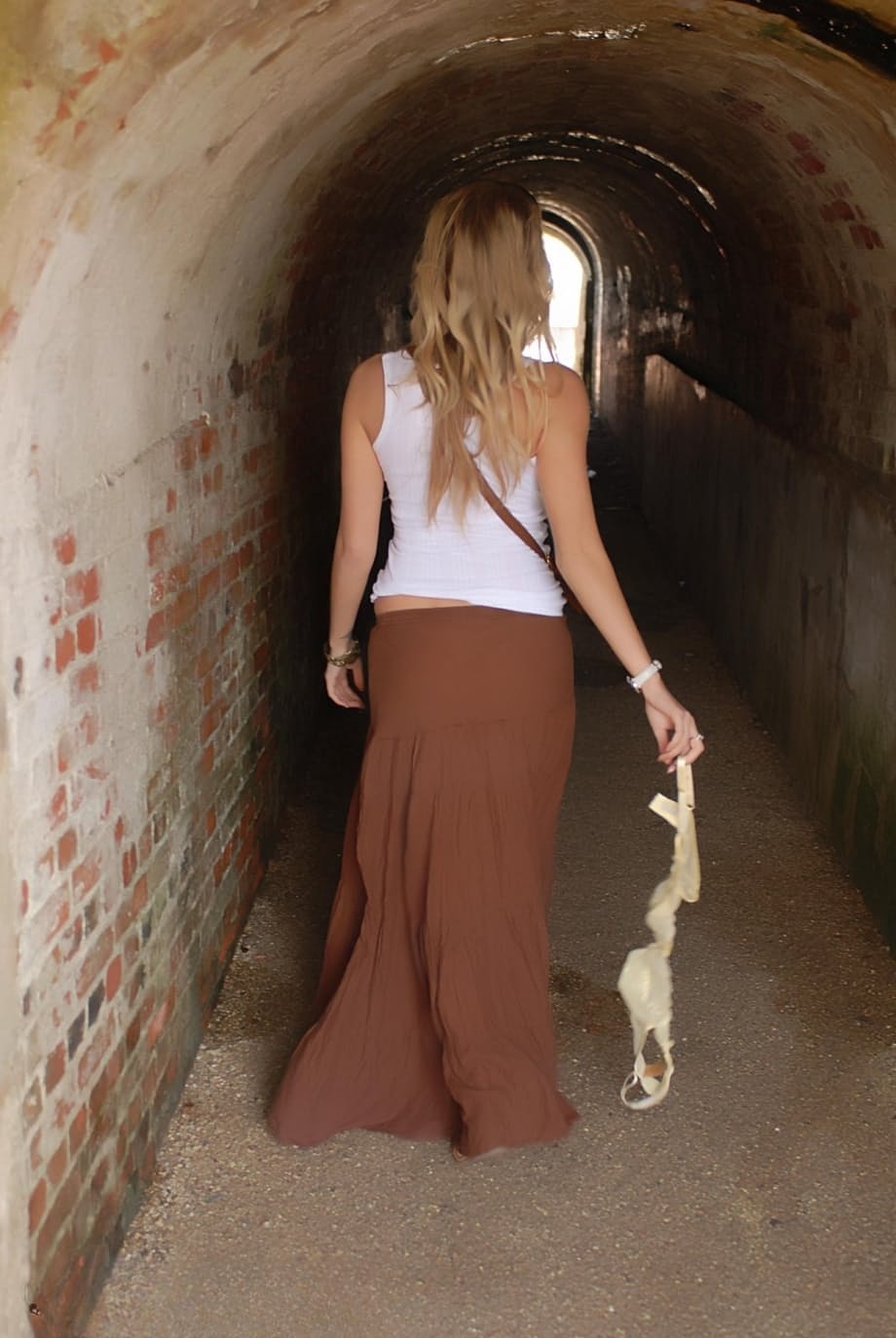 Solo girl Hayley Marie Coppin flashes her bare ass while walking on sidewalk
