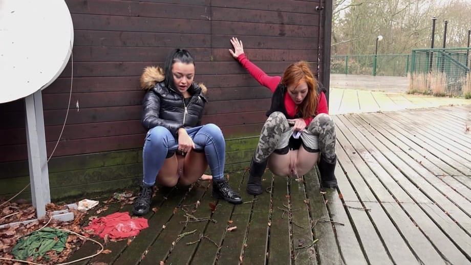 Naughty chick Sandra and her best friend pull down their pants and pee outside