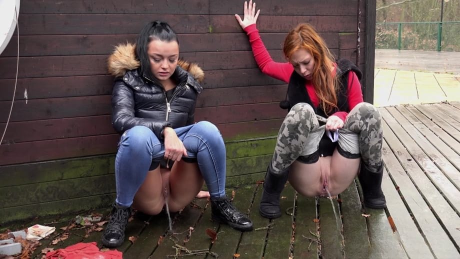 Naughty chick Sandra and her best friend pull down their pants and pee outside