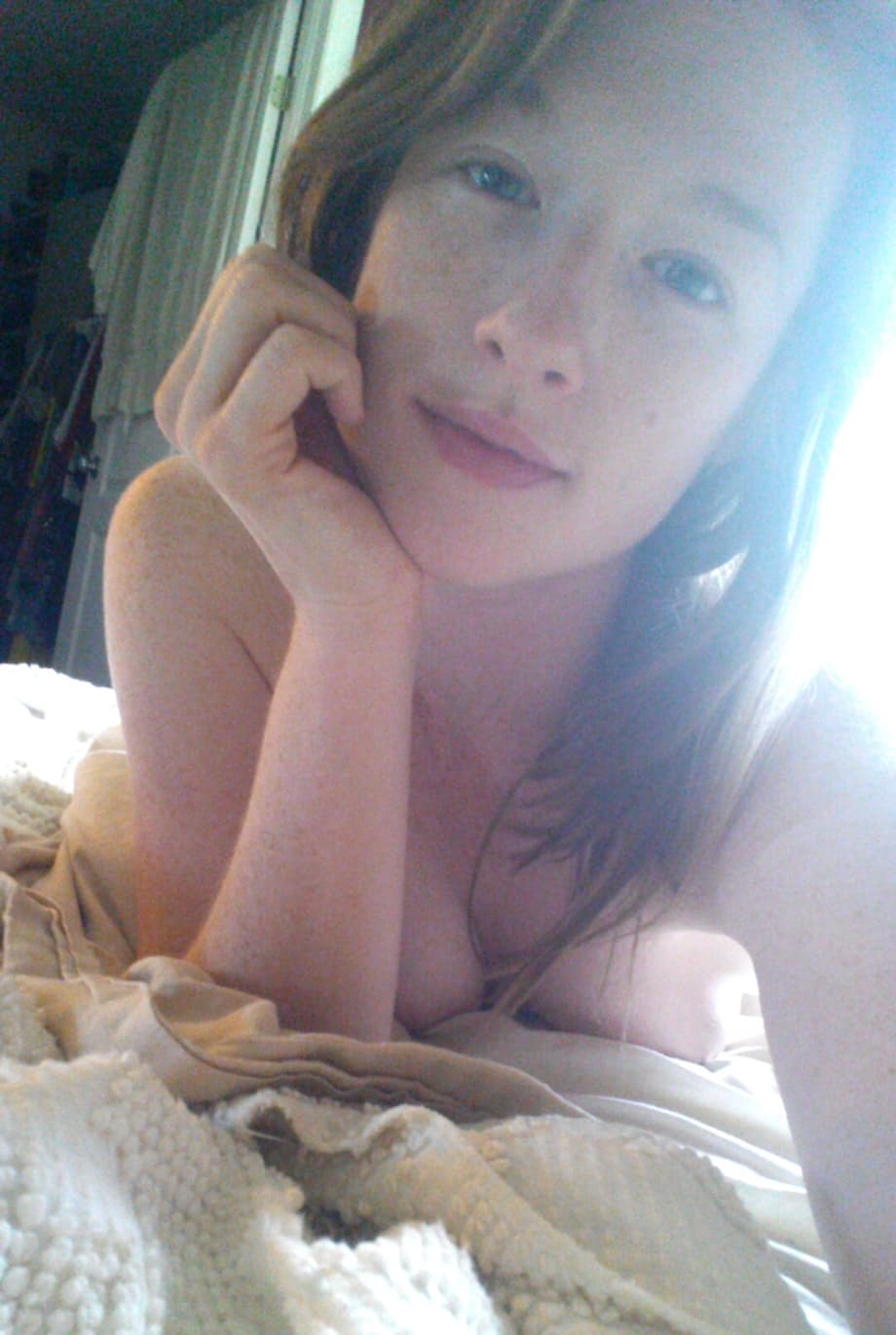 Solo girl Gemma Minx takes selfies in various states of undress