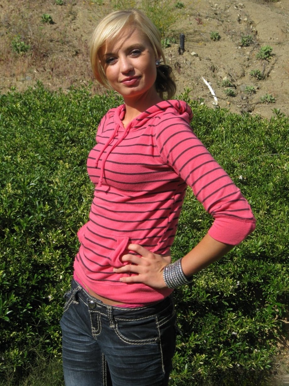 Sexy blonde chick shows off her almost flat chest and twat for the first time