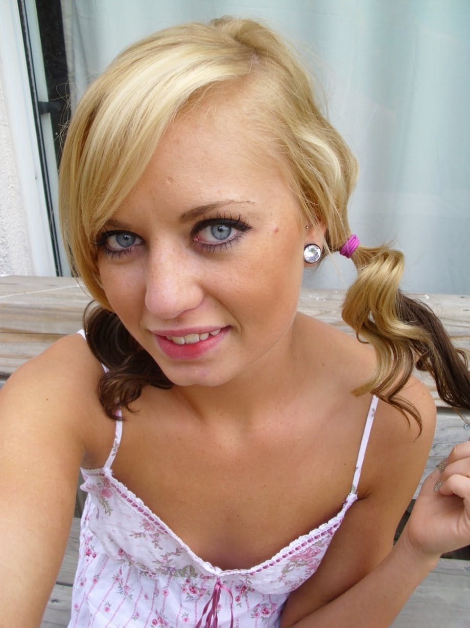 Pretty blonde Tiny Tiff shows her teensy tits & flashes a naked upskirt