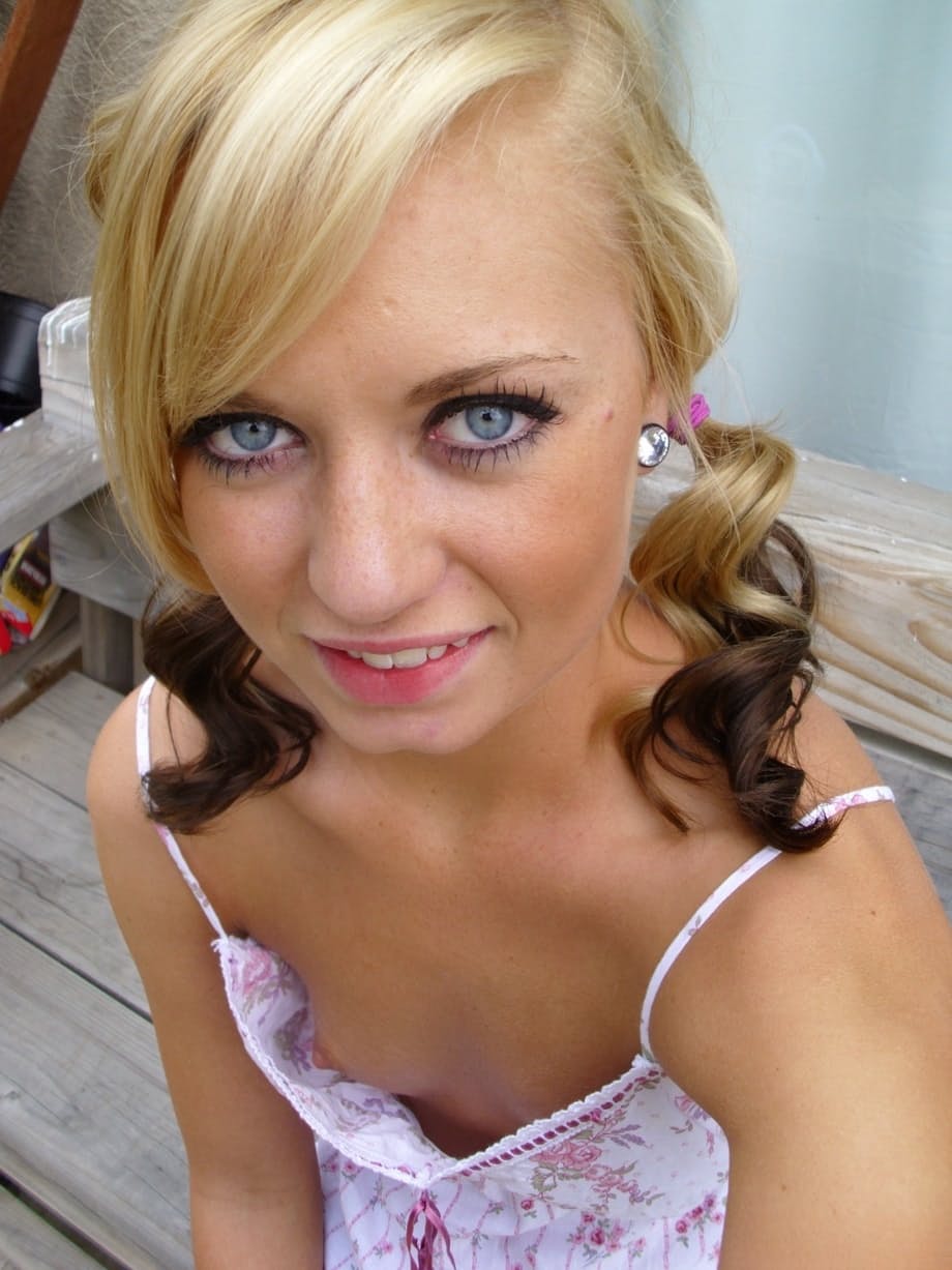 Pretty blonde Tiny Tiff shows her teensy tits & flashes a naked upskirt
