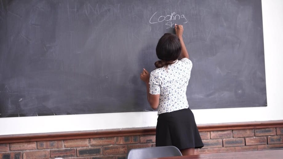 Ebony schoolteacher Kiki Minaj sports the no panty upskirt look on her desk