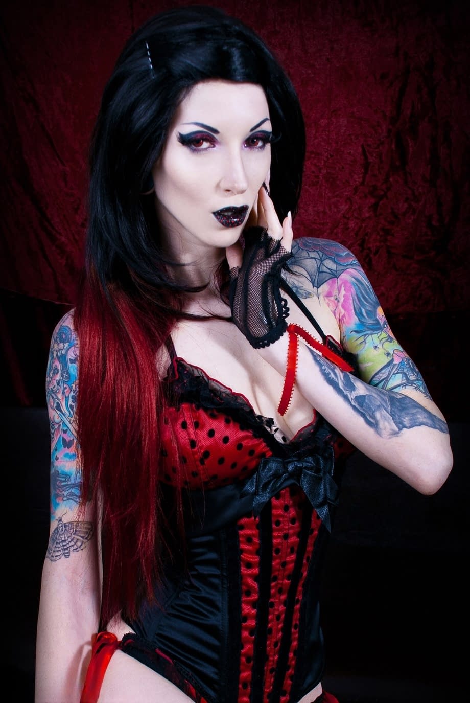 Top Goth model Razor Candi strikes great poses in solo action