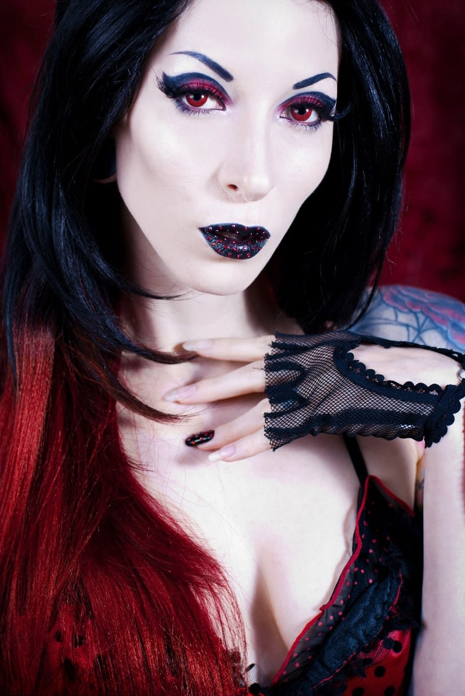 Top Goth model Razor Candi strikes great poses in solo action