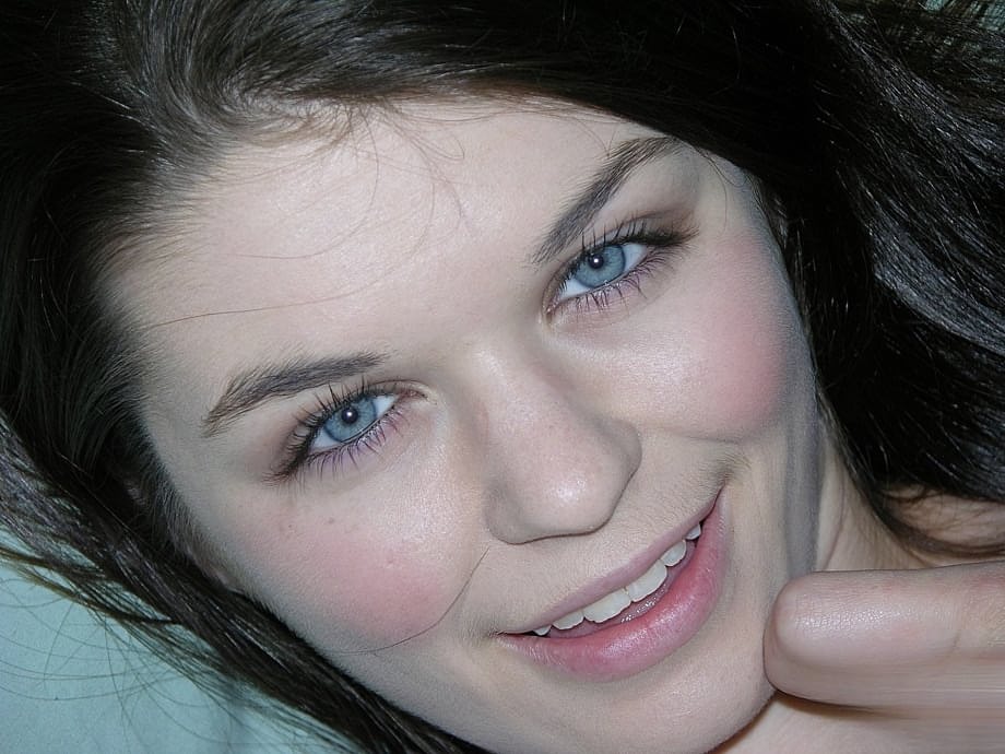 Cute amateur Anastasia Rose uncovers her natural tits before showing her pussy