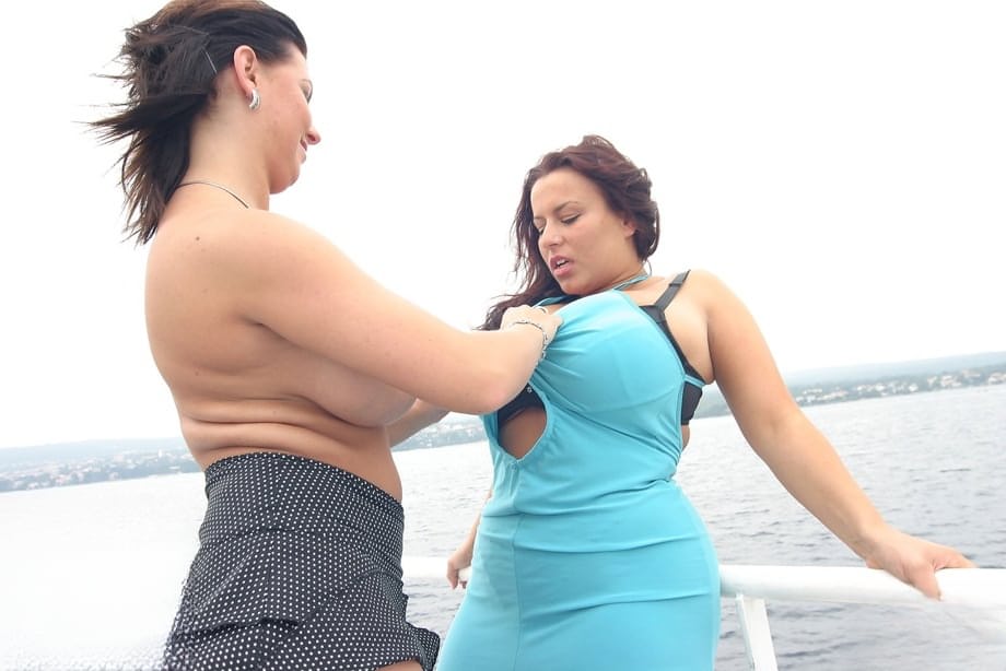 Thick women Kora Kryk & Aneta Buena expose huge tits atop a cruise liner
