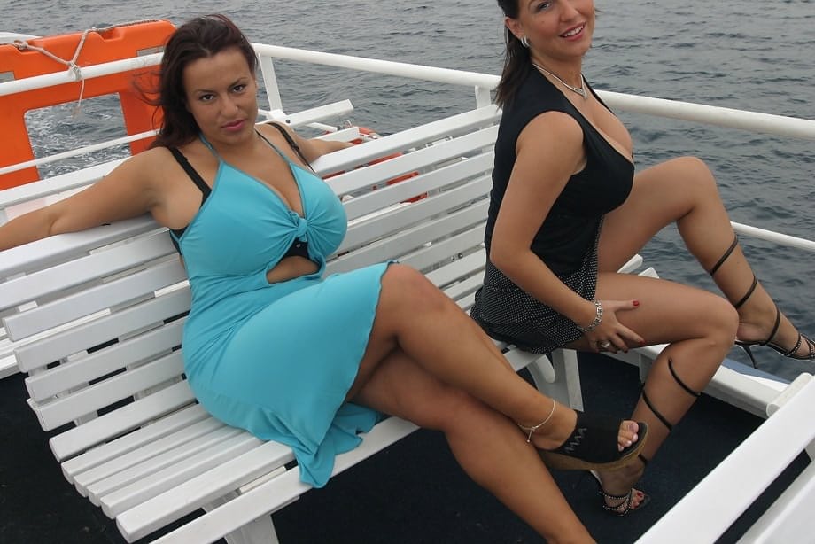 Thick women Kora Kryk & Aneta Buena expose huge tits atop a cruise liner