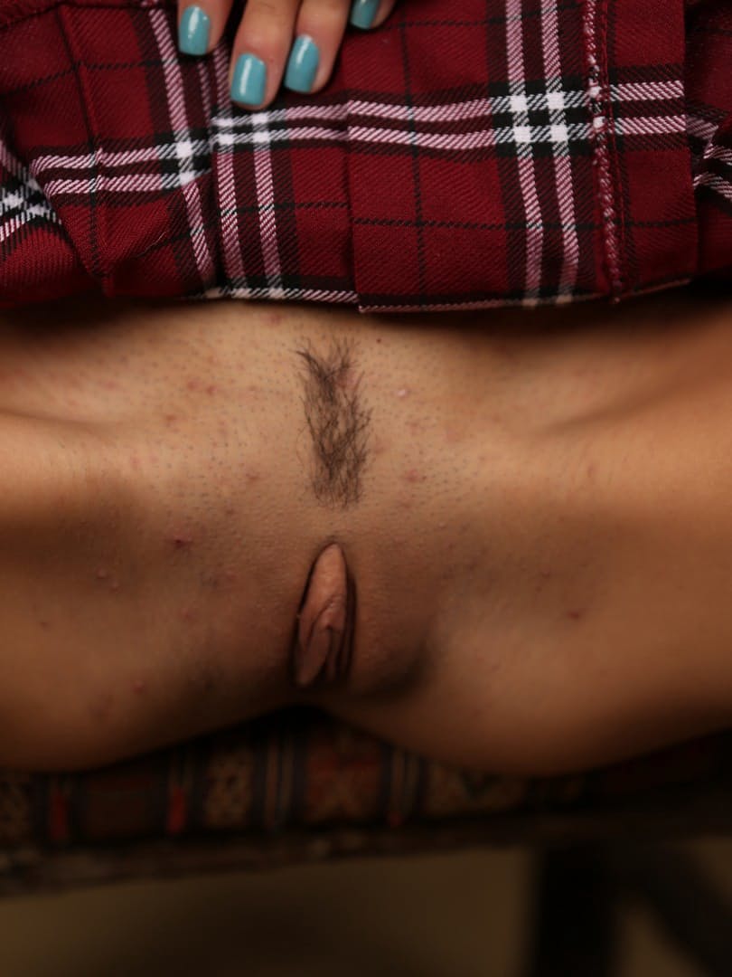 Petite girl Janice Griffith frees her tight slit from upskirt panties