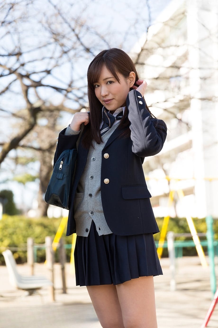 Japanese schoolgirl pulls down her cotton underwear during upskirt action