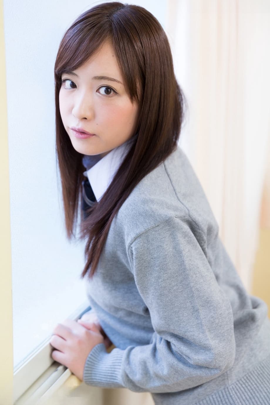 Japanese schoolgirl pulls down her cotton underwear during upskirt action