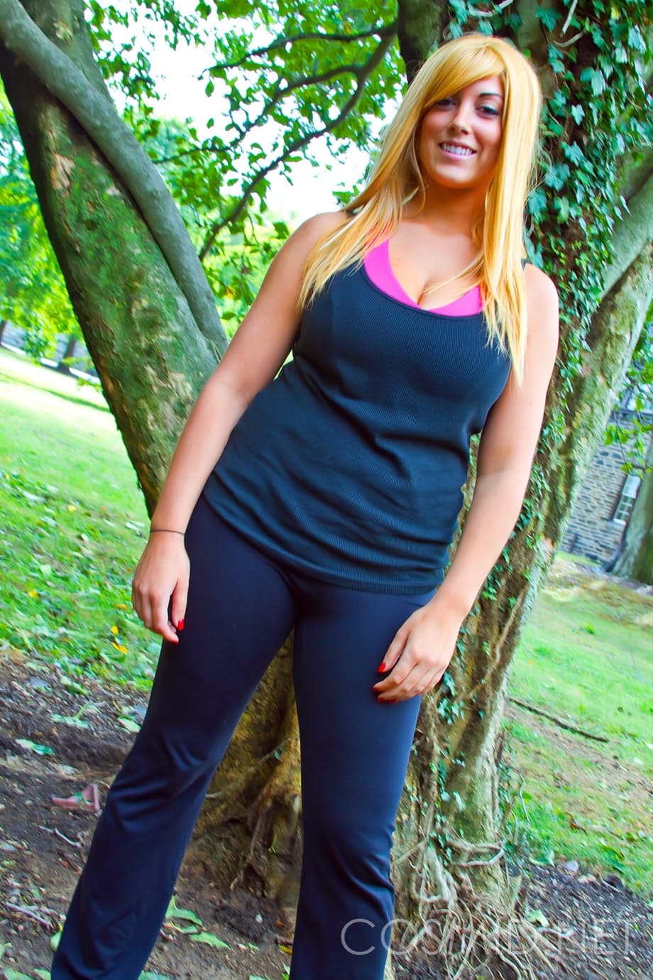 Brassy blonde fatty Tasha Cole removes shirt outside to pose in yoga pants