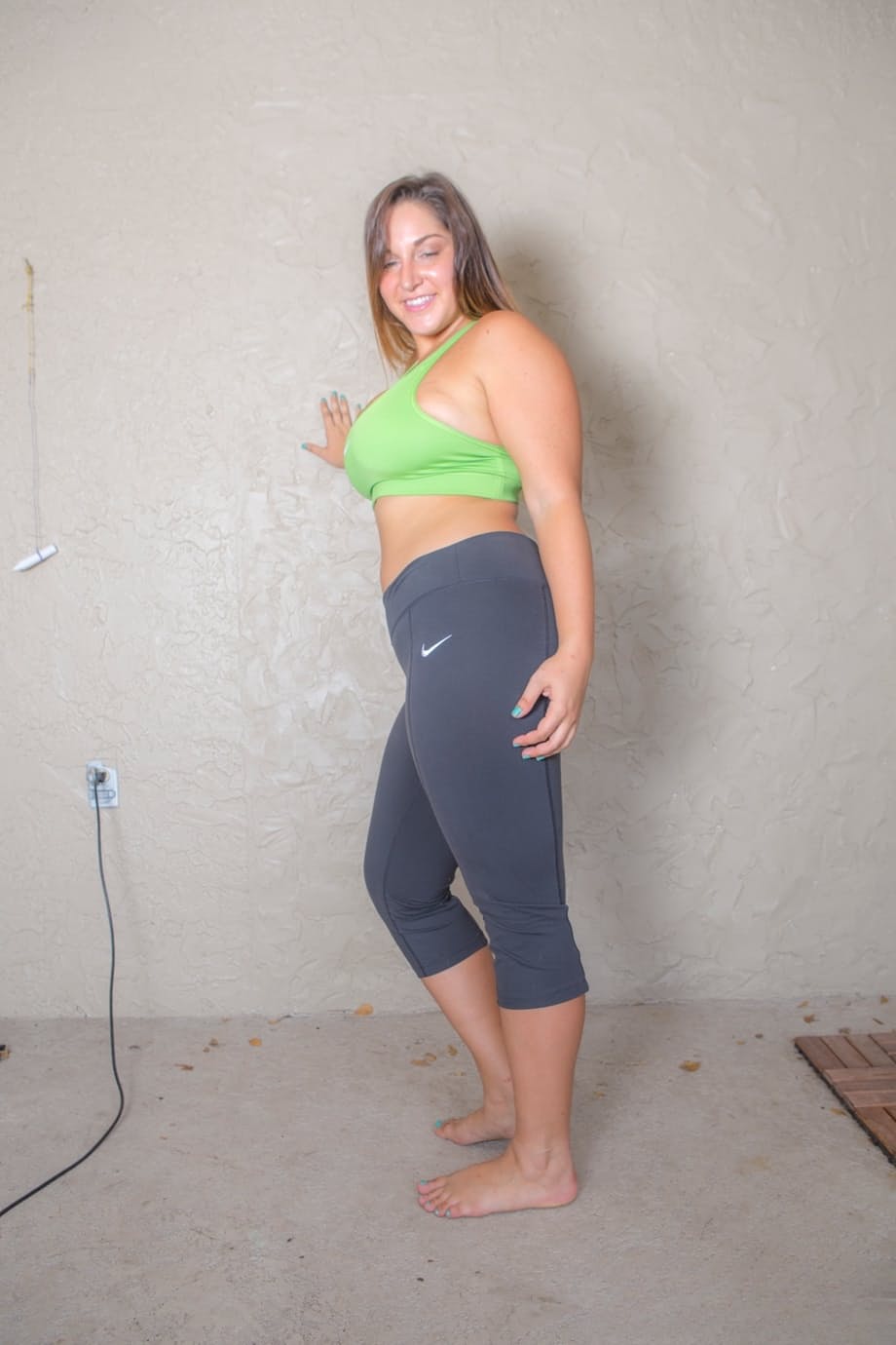Horny Allie Giovanni with big tits bending over naked to show her BBW ass