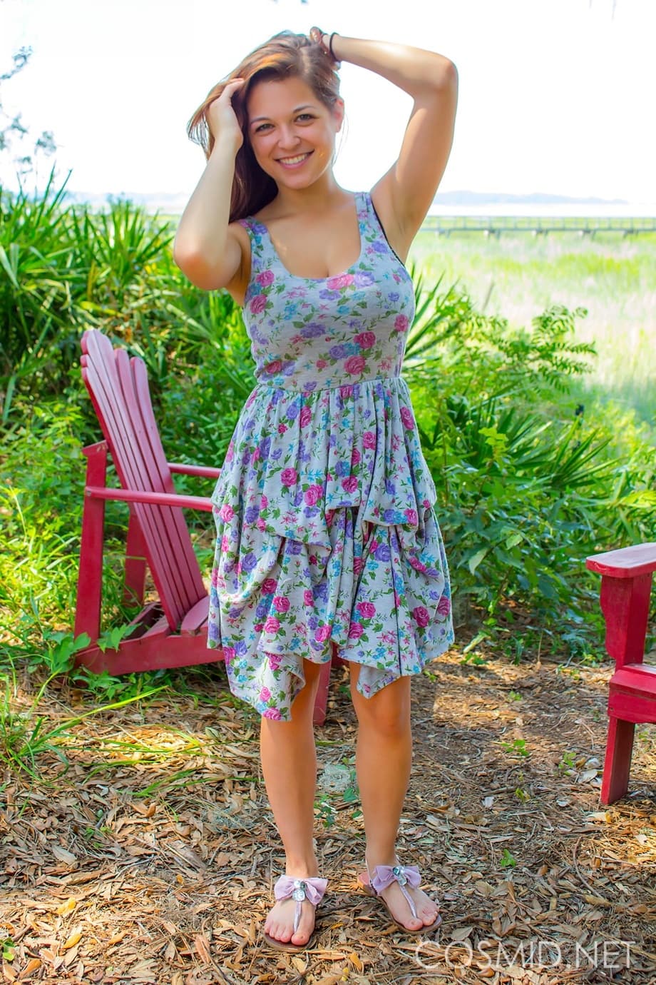 Hot amateur Tessa Fowler disrobing outdoors to tan her big tits in the yard