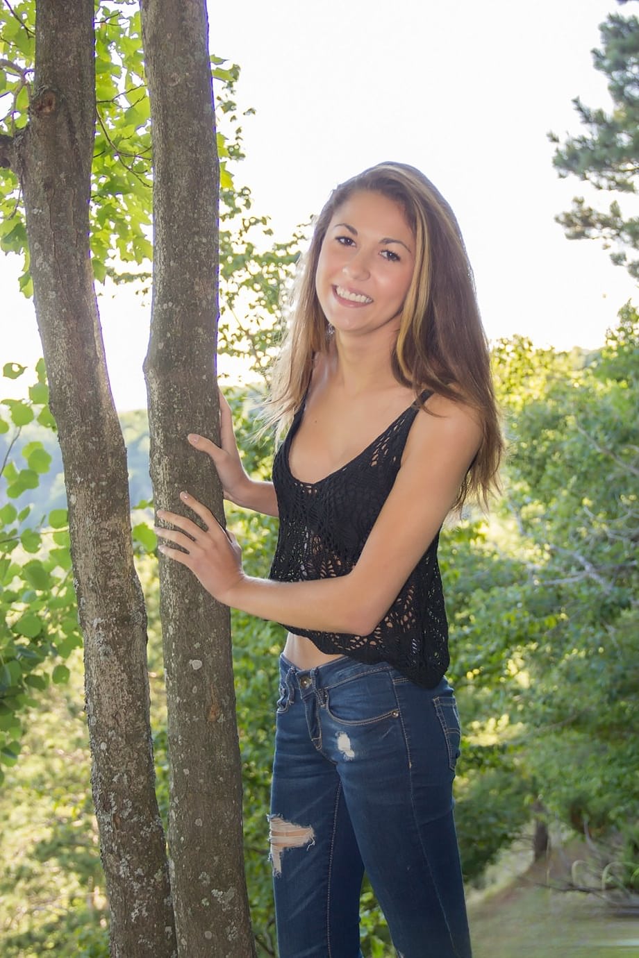 Amateur chick Becca Clark uncovers her nice tits out in the backyard