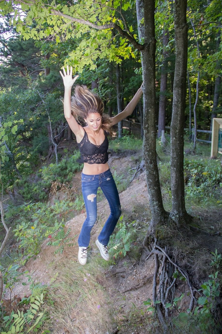 Amateur chick Becca Clark uncovers her nice tits out in the backyard