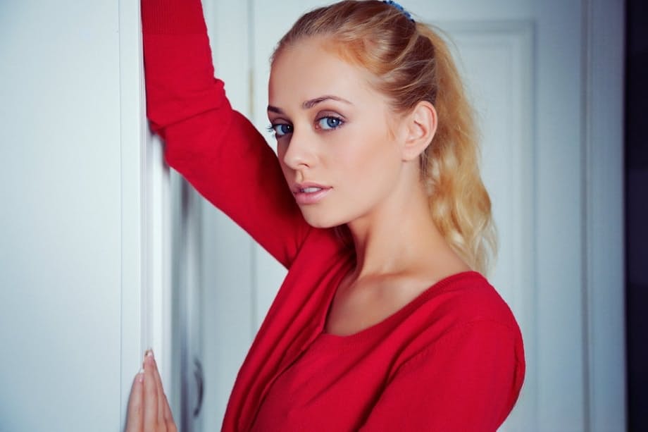Hot blonde Jennifer Mackay showing perky tits and bare ass wearing a sweater