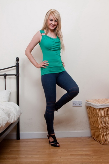 Horny blonde Katie K peels tight jeans to jam a dildo in her horny pussy naked