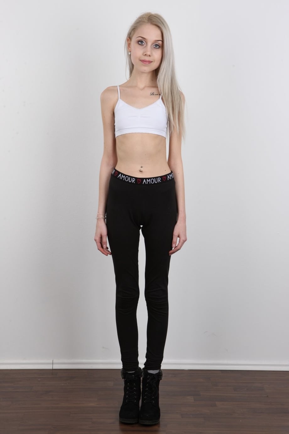 Skinny 18 year old virgin Natalia takes off her clothes to stand in the nude