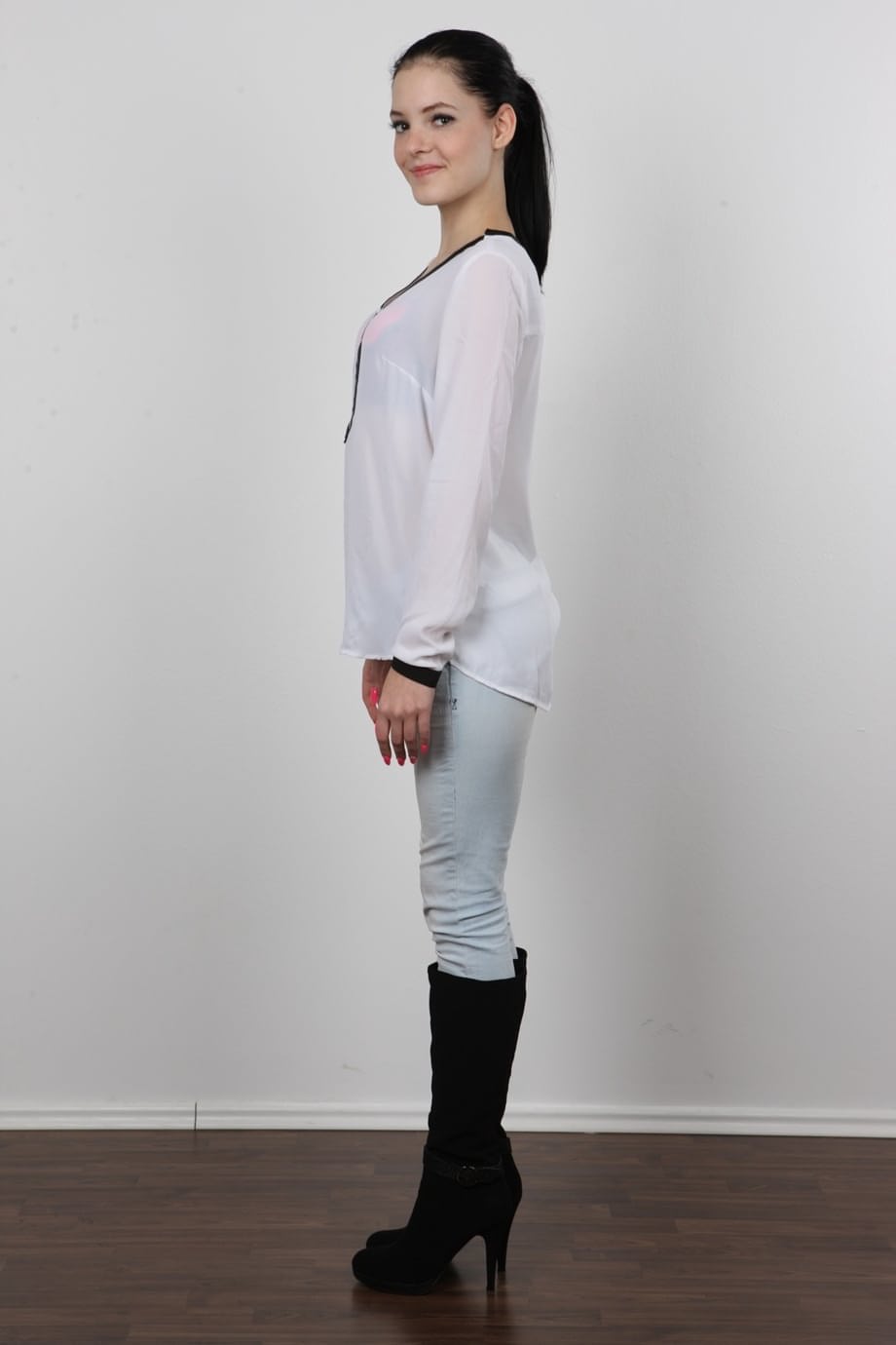 Cute teen Aneta peels her jeans to pose naked for a casting shoot