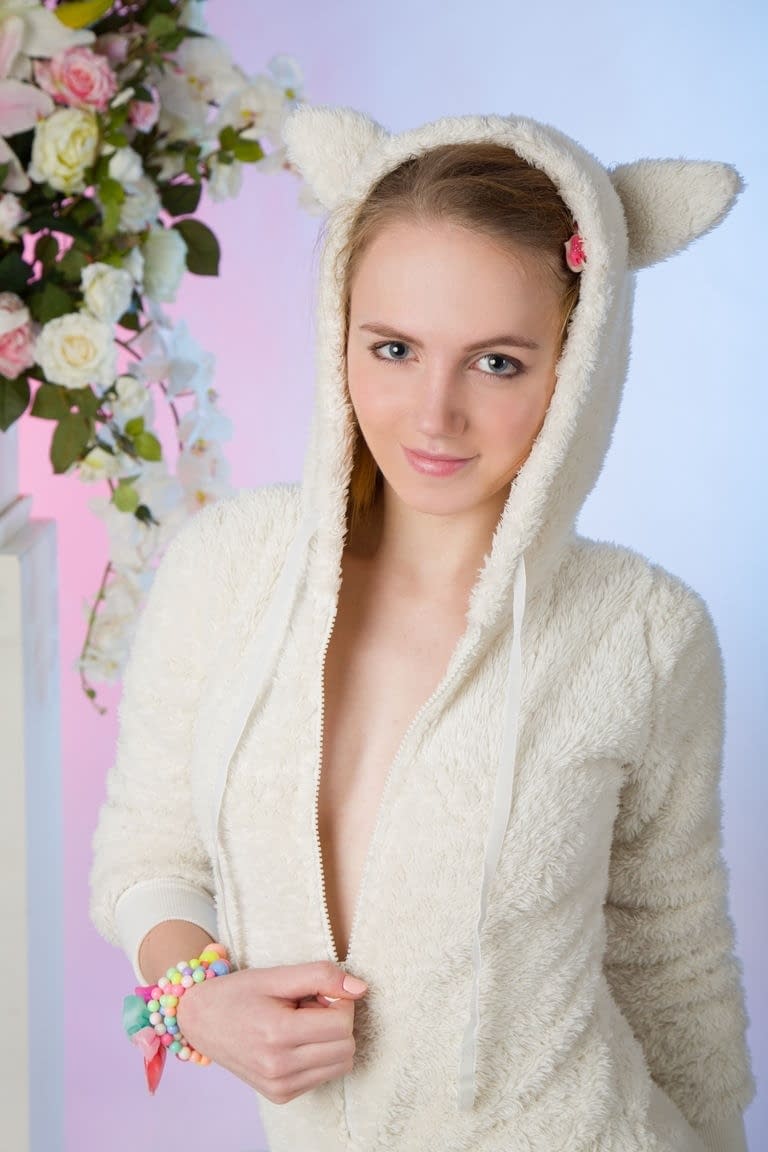 Sexy bunny Belonika in pigtails strips to show her bald teen pussy closeup