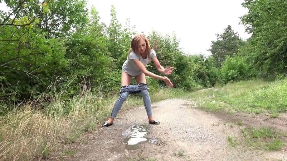 Hot blonde Rose can't find a bathroom so she squats to pee along the path