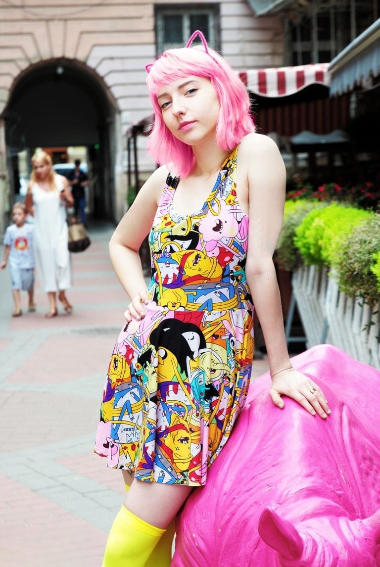 Teen solo girl with pink hair display her bald twat in yellow OTK socks