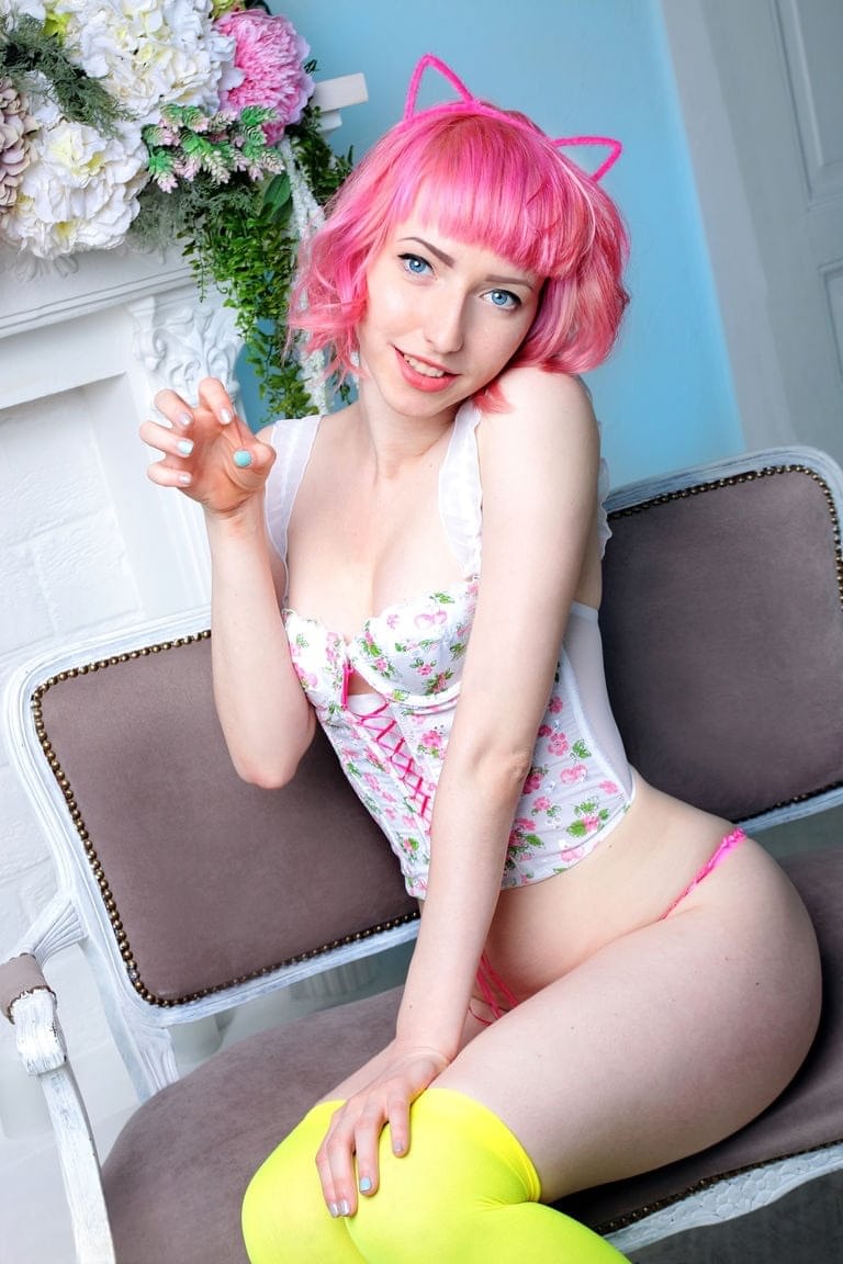 Teen solo girl with pink hair display her bald twat in yellow OTK socks