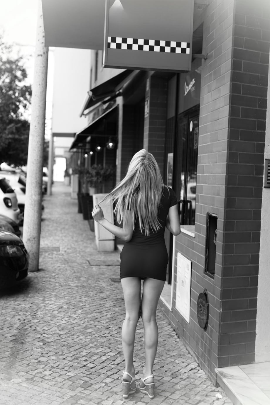 Thin blond chick Chloe Toy enjoys a smoke as she goes about her daily business
