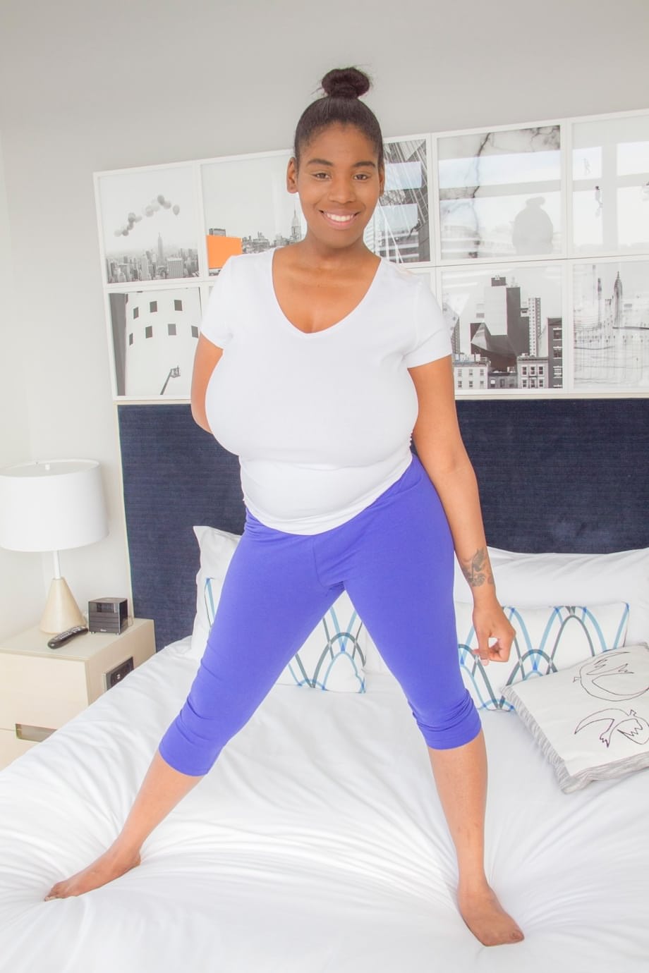 Thick black chick unleashes her huge saggy boobs in her underwear