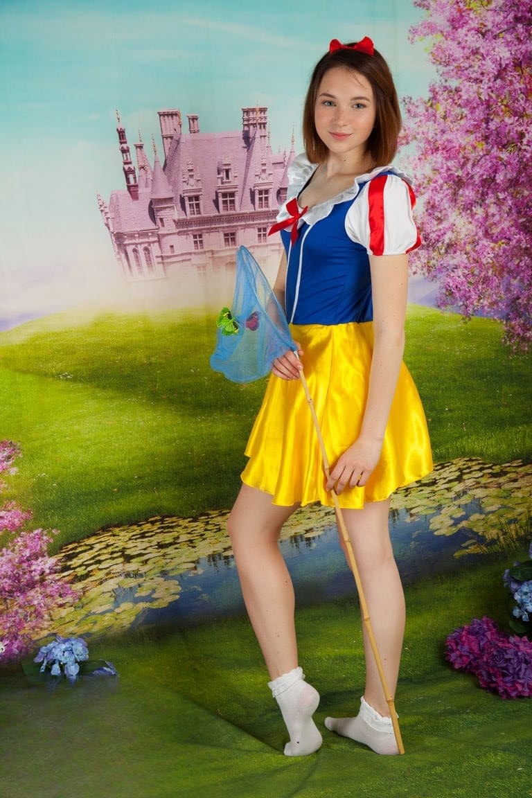 Cute teen cosplay girl Slava strips her costume to spread with bare feet