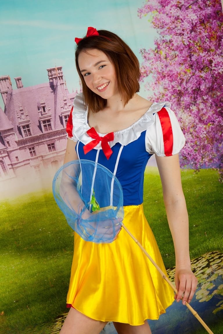 Cute teen cosplay girl Slava strips her costume to spread with bare feet