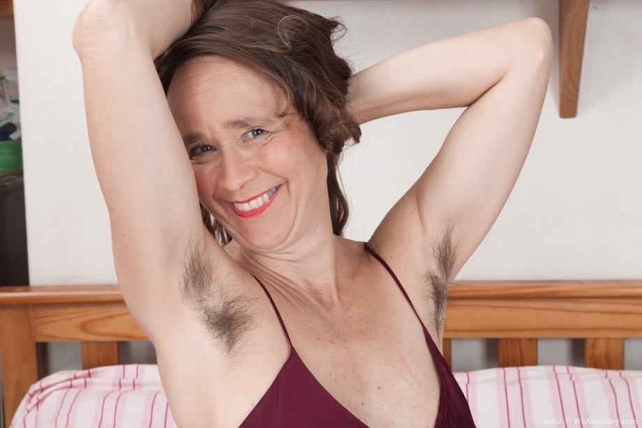 Older lady with big tits shows off her really hairy bush for the first time