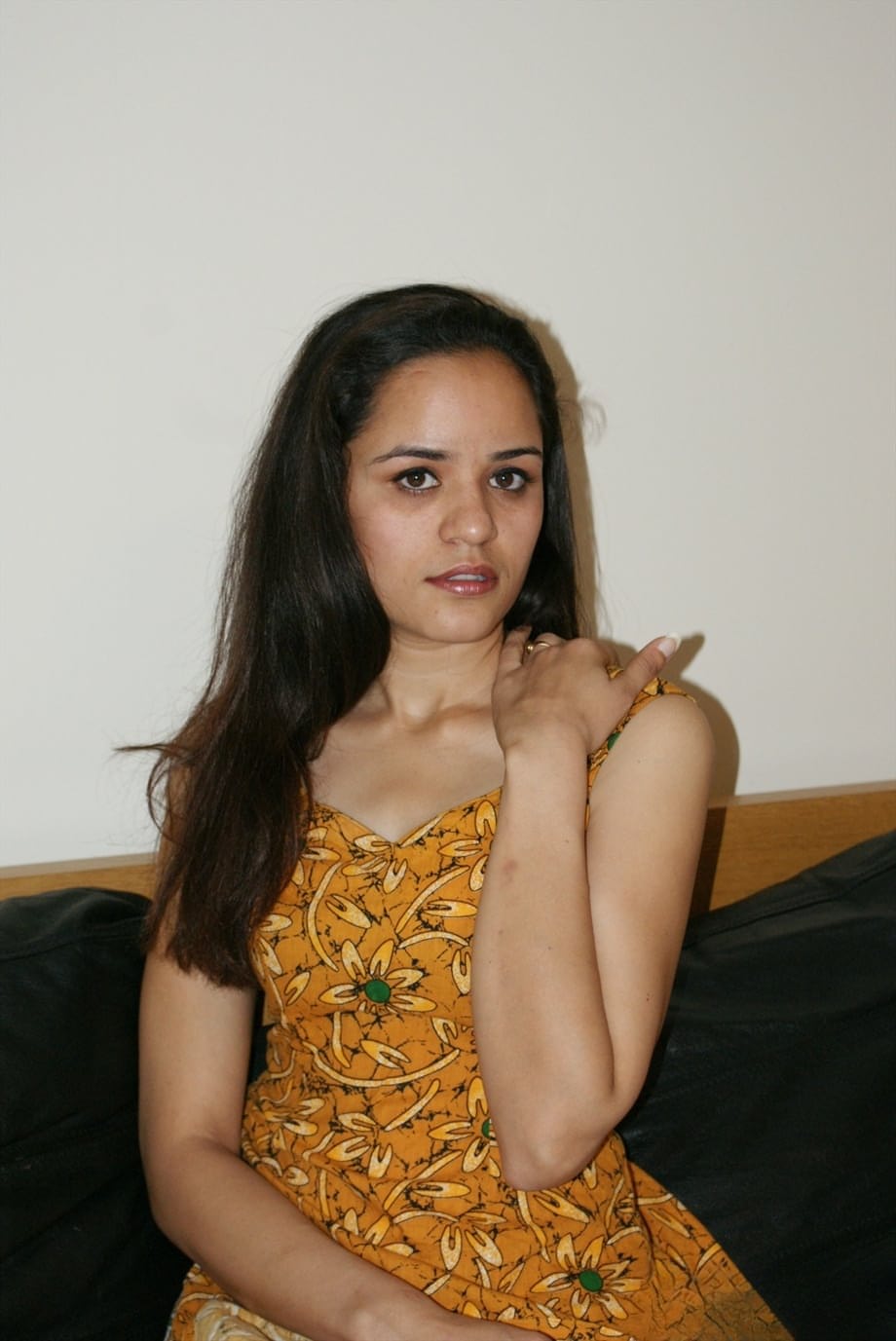 Small titted young Indian girl undressing slowly to lounge naked on her bed