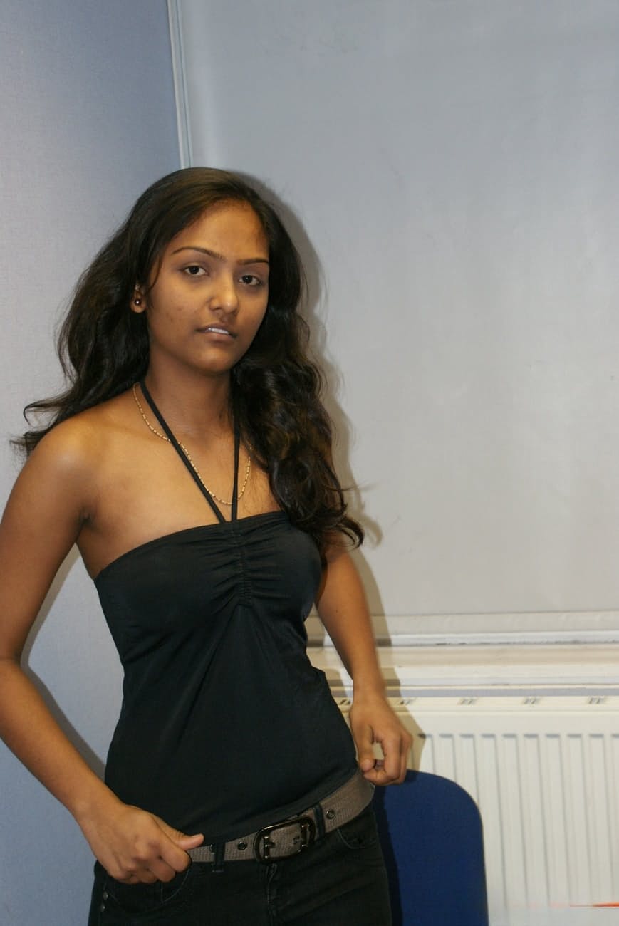 Desi solo girl holds her nice tits as she undresses to model in the nude
