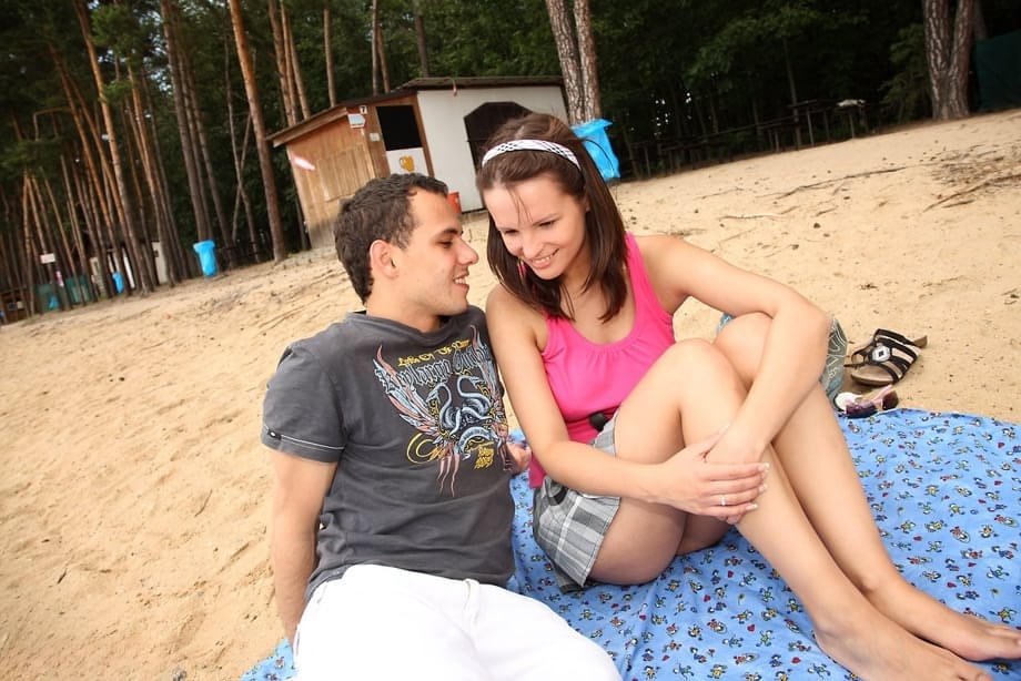 Cute teen girl avoids unwanted pregnancy by sucking off her bf at campground