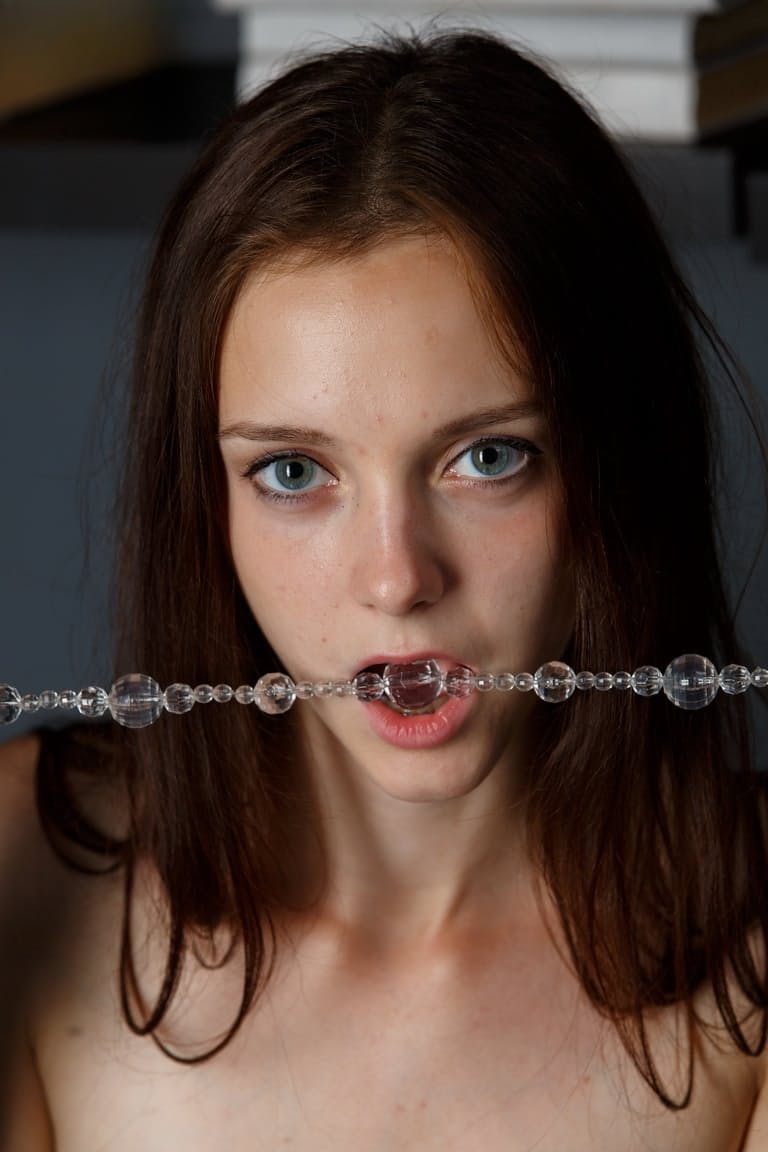 Skinny teen Lapa sheds her shorts to reveal her tiny tits & petite pussy