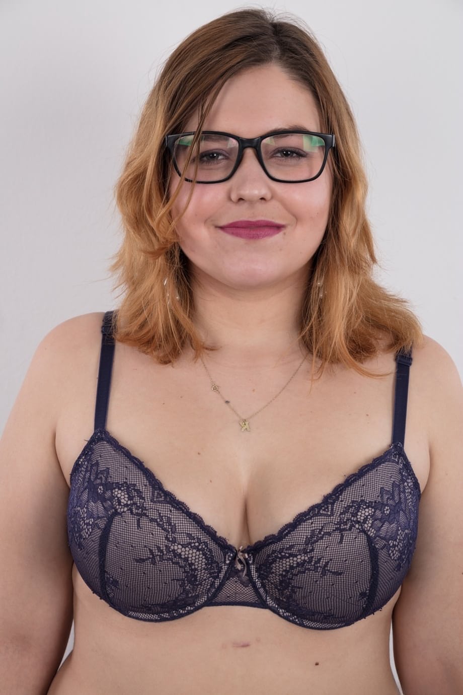 Amateur fatty Karolina shows her flab in the nude wit her glasses on
