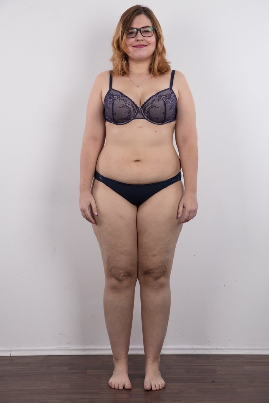 Amateur fatty Karolina shows her flab in the nude wit her glasses on