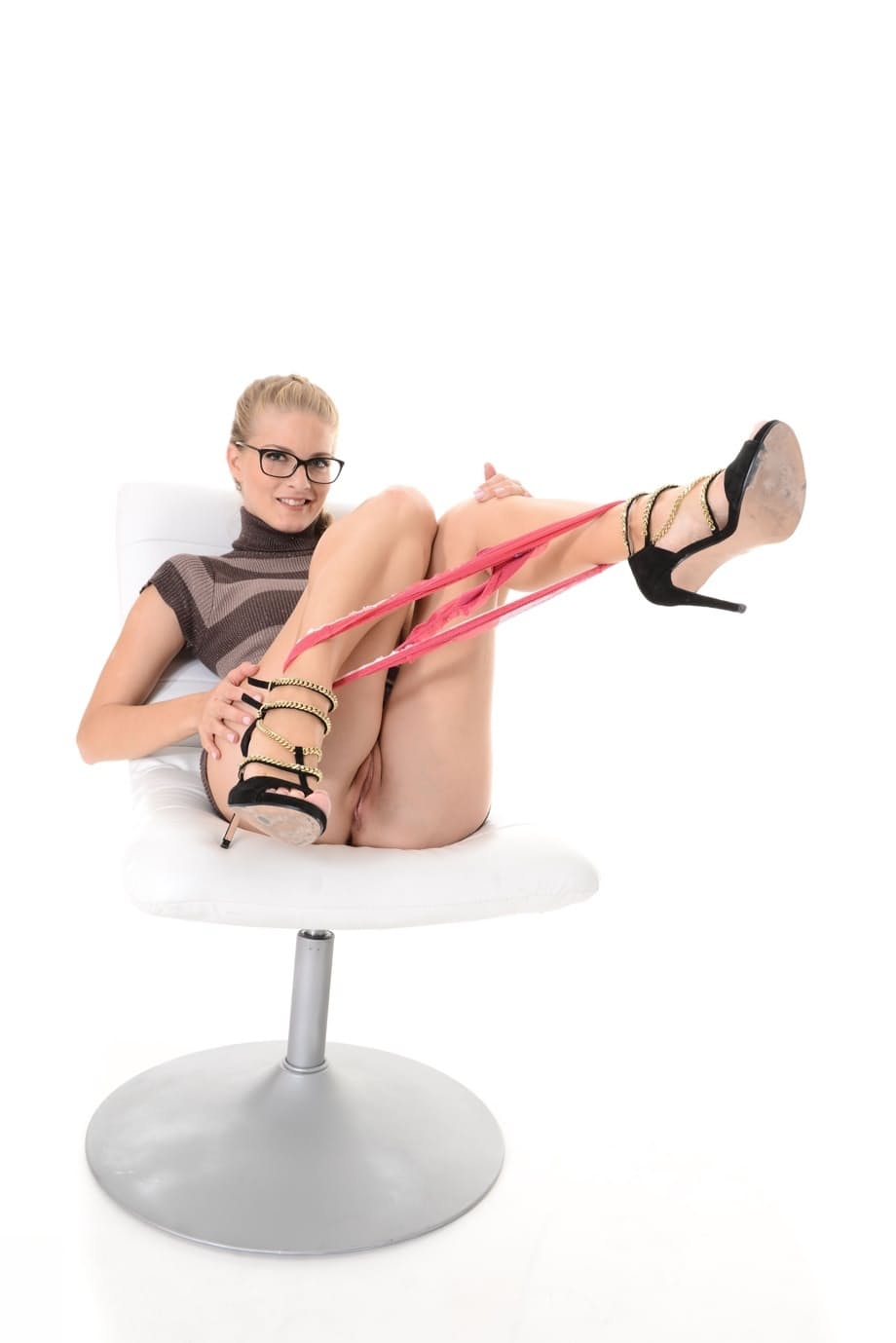 Nerdy blonde MILF Cayenne Klein strips down naked and shows off her holes