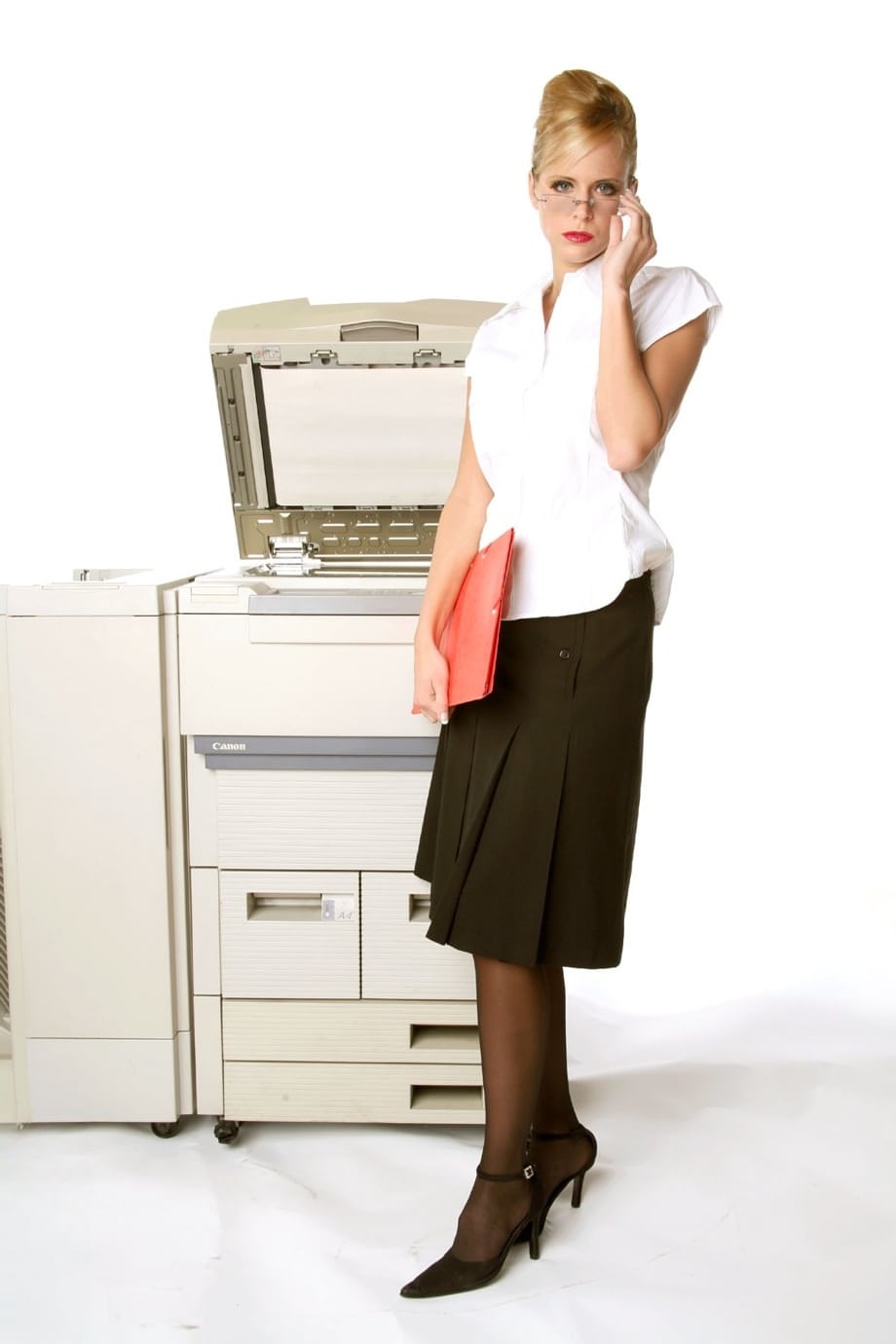 Sizzling hot busty secretary Zuzana works the copy machine in black stockings